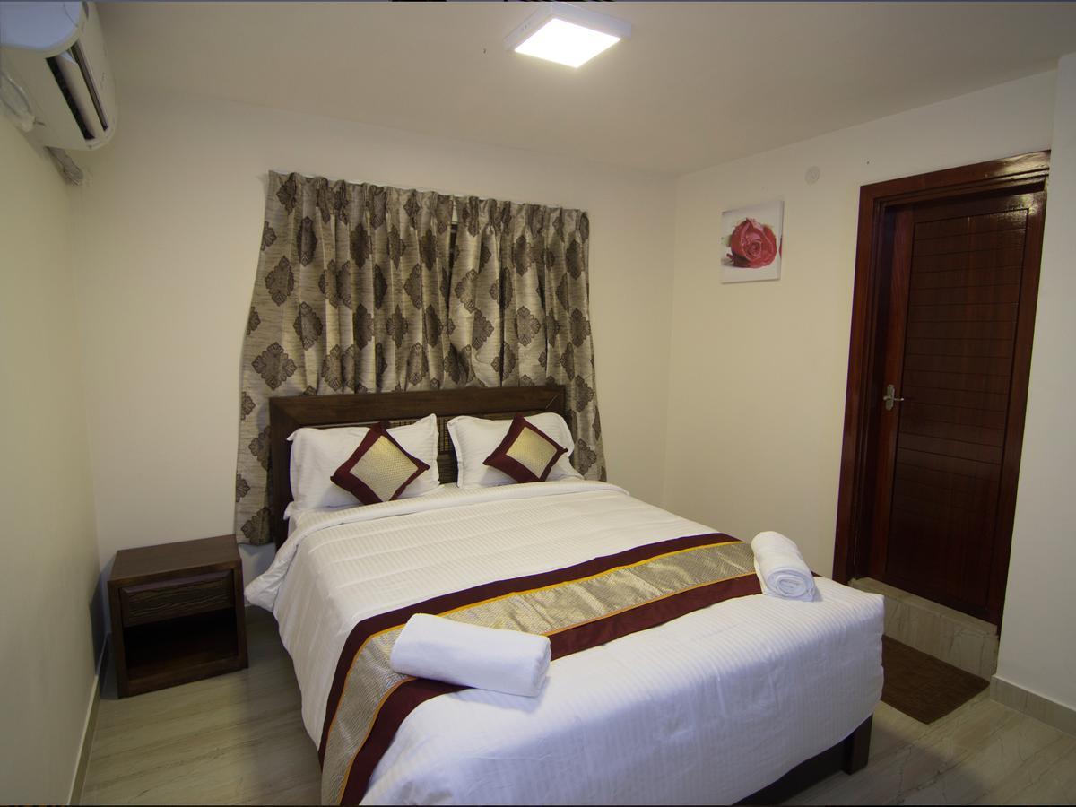 Iris Comfort Inn Madras Buitenkant foto